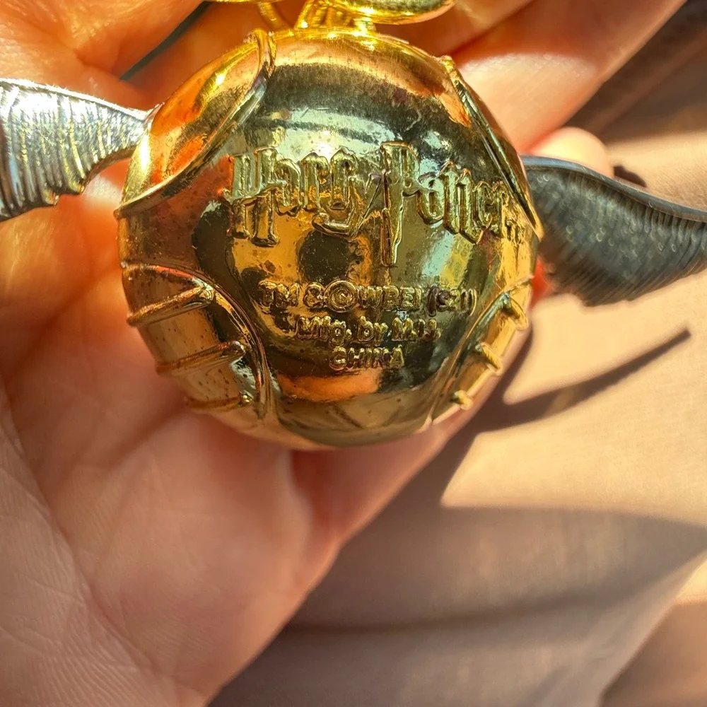 Harry Potter Golden Snitch Keychain Gold Silver Metal Quidditch Warner Bros 2021